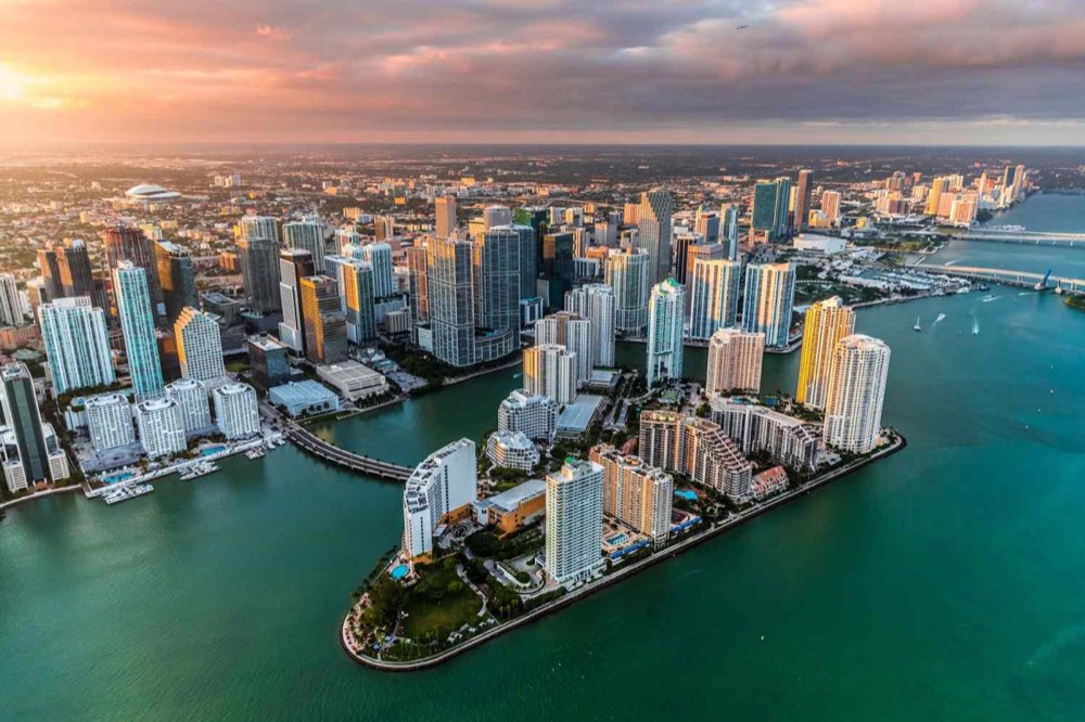 Brickell skyline at sunset over Biscayne Bay